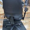 Vinyl Covered Operator Chair with Adjustable Armrests