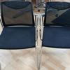 Pair of Matching Stackable Chrome Frame Black Mesh Chairs with Fixed Arms 