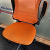 Orange Mesh Operator Chairs with Foldback Arms