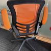 Orange Mesh Operator Chairs with Foldback Arms
