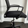 Black Mesh Operator Chair with Fixed Arms