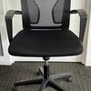 Black Mesh Operator Chair with Fixed Arms