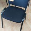 Used Black Fabric Stacking Flipper Chair